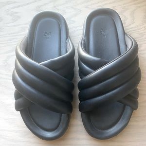 Black puffy slides